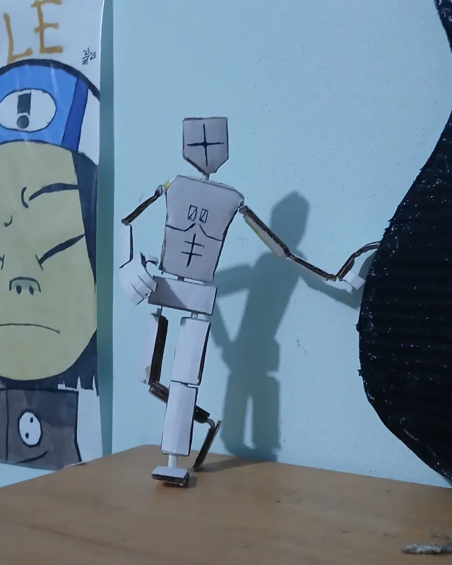 boneco de papelão